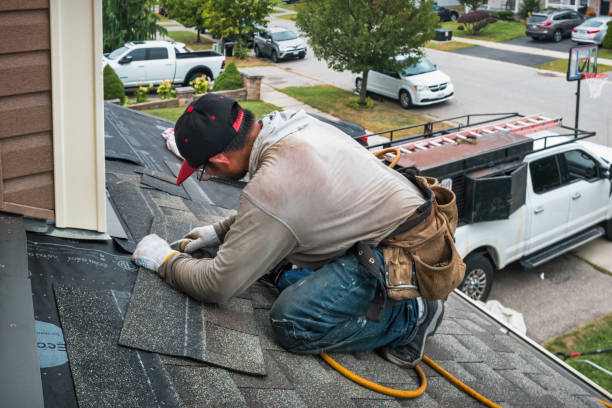 Professional Roofing technician working in Claremont, VA